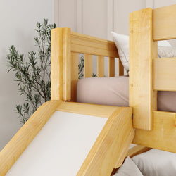 Wooden bunk bed with slide in a cozy bedroom setting, featuring a houseplant and soft bedding. Perfect for kids' room decor.
