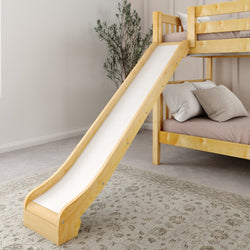 Wooden bunk bed with slide in neutral bedroom setting.