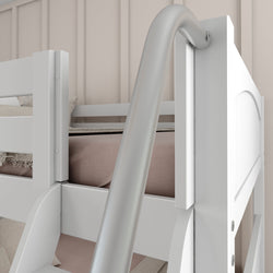 White bunk bed with a slide and beige bedding in a modern bedroom.