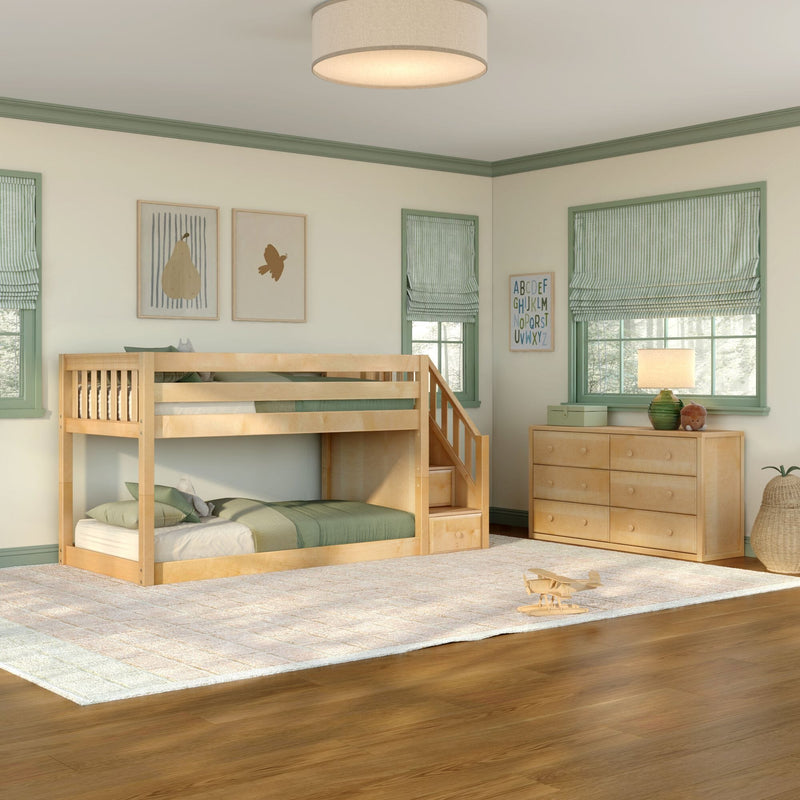 Children's bedroom with natural wood loft bunk bed and stairs, green window trim and roman shades, wooden dresser and toy airplane