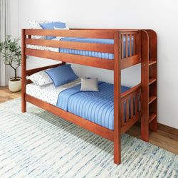 Wooden bunk bed with blue bedding in a modern bedroom setting.