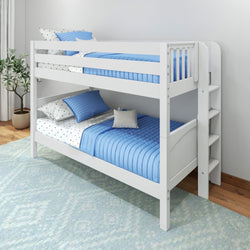 White bunk bed with blue bedding and ladder in a modern kids' bedroom.