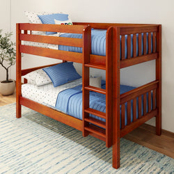 Wooden bunk bed with blue bedding and a colorful pillow in a cozy bedroom setting.