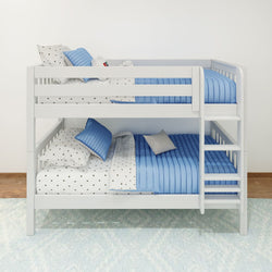 White bunk bed with blue bedding and polka dot sheets in a child's room.