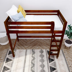 Loft bed with wooden frame and white bedding in a modern bedroom setting featuring decorative pillows and a patterned rug.