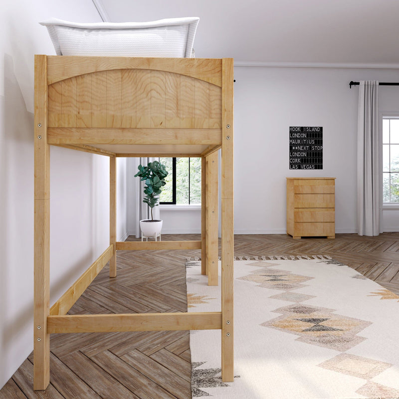 Natural wood loft bed with white pillow in a minimalist Scandinavian bedroom featuring a wooden dresser, potted plant, herringbone wood floor and neutral patterned rug