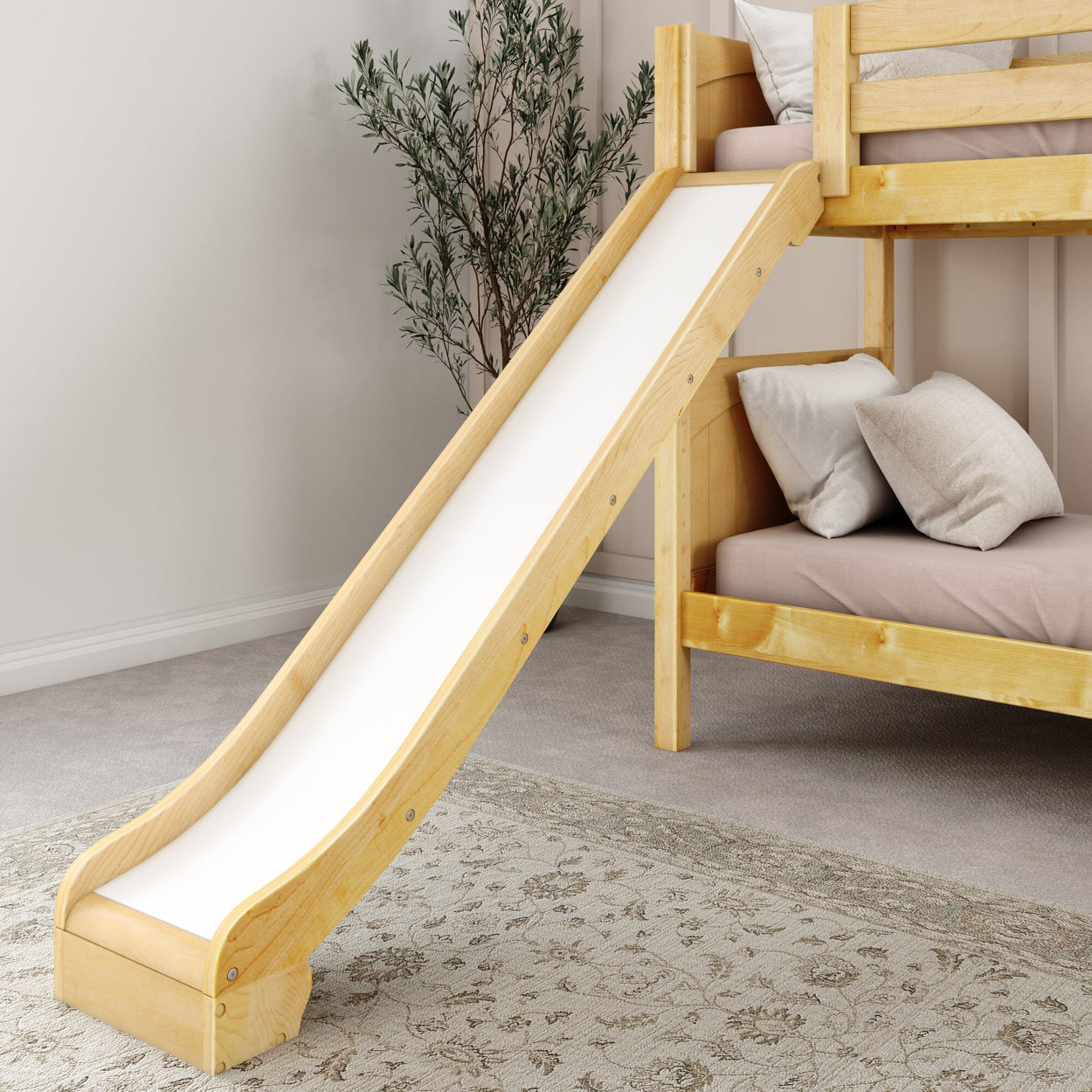 Wooden bunk bed with a slide and cozy bedding in a children's bedroom.