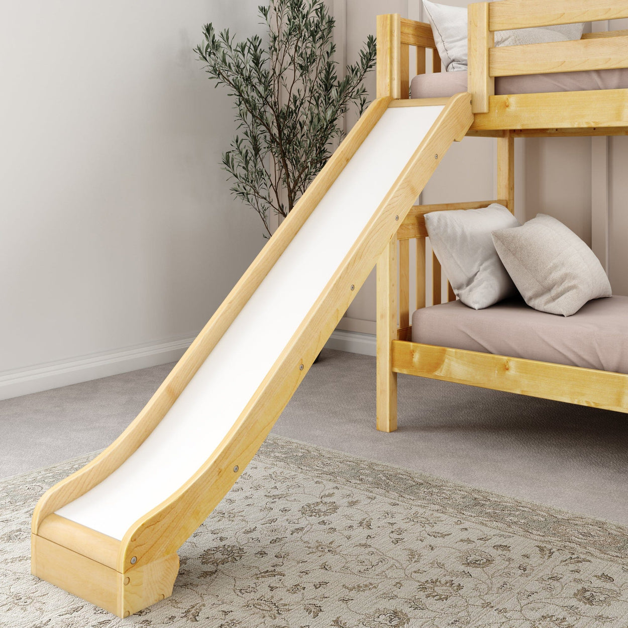Wooden bunk bed with slide and cozy pillows in stylish bedroom.
