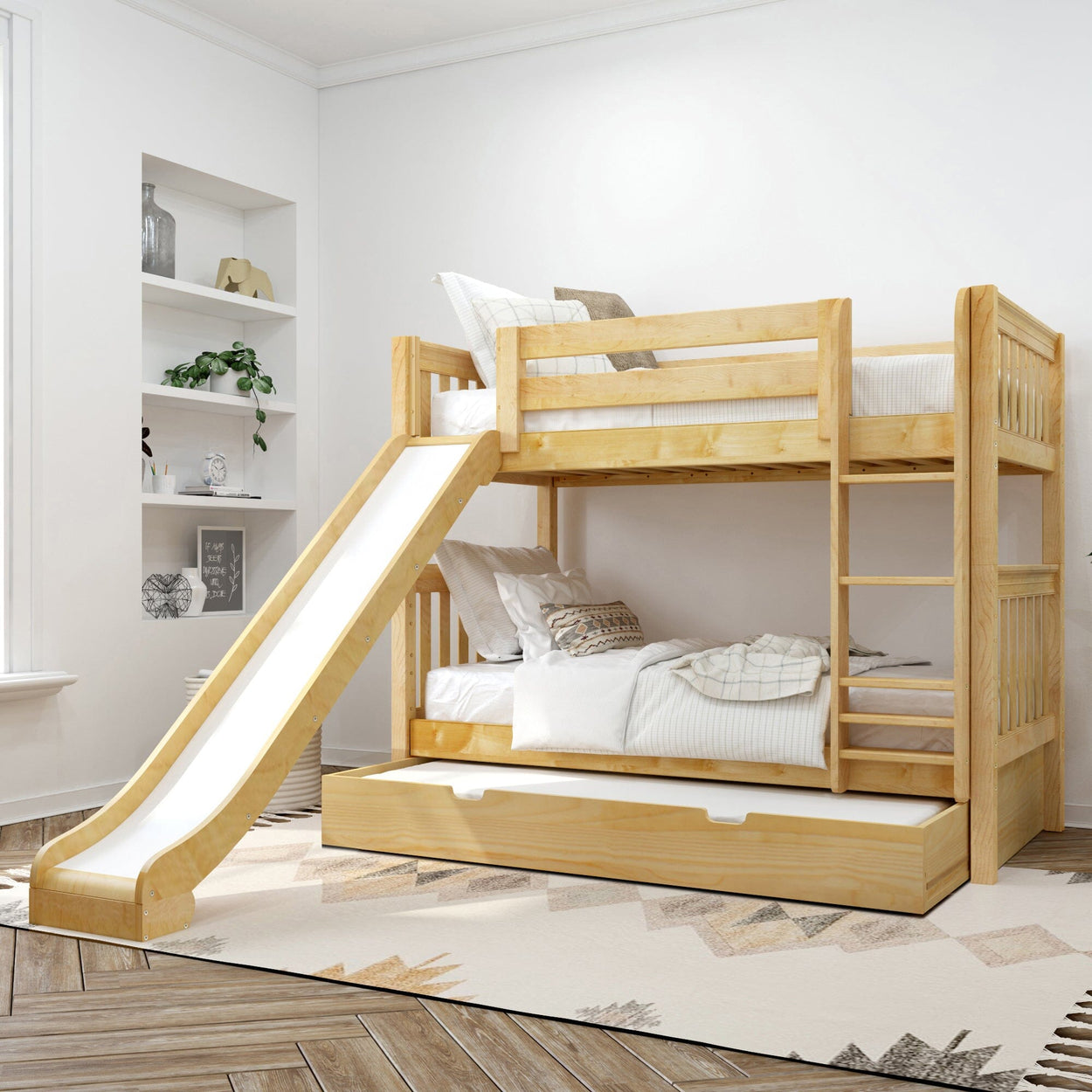 Natural pine kids bunk bed with slide, ladder and pull-out trundle in bright children's bedroom with neutral bedding and rug