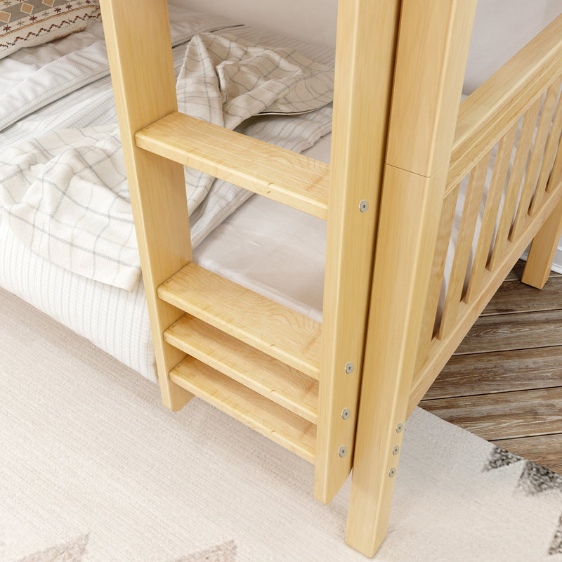 Light natural pine bunk bed ladder and corner post with slatted guardrail, plaid bedding and wood floor