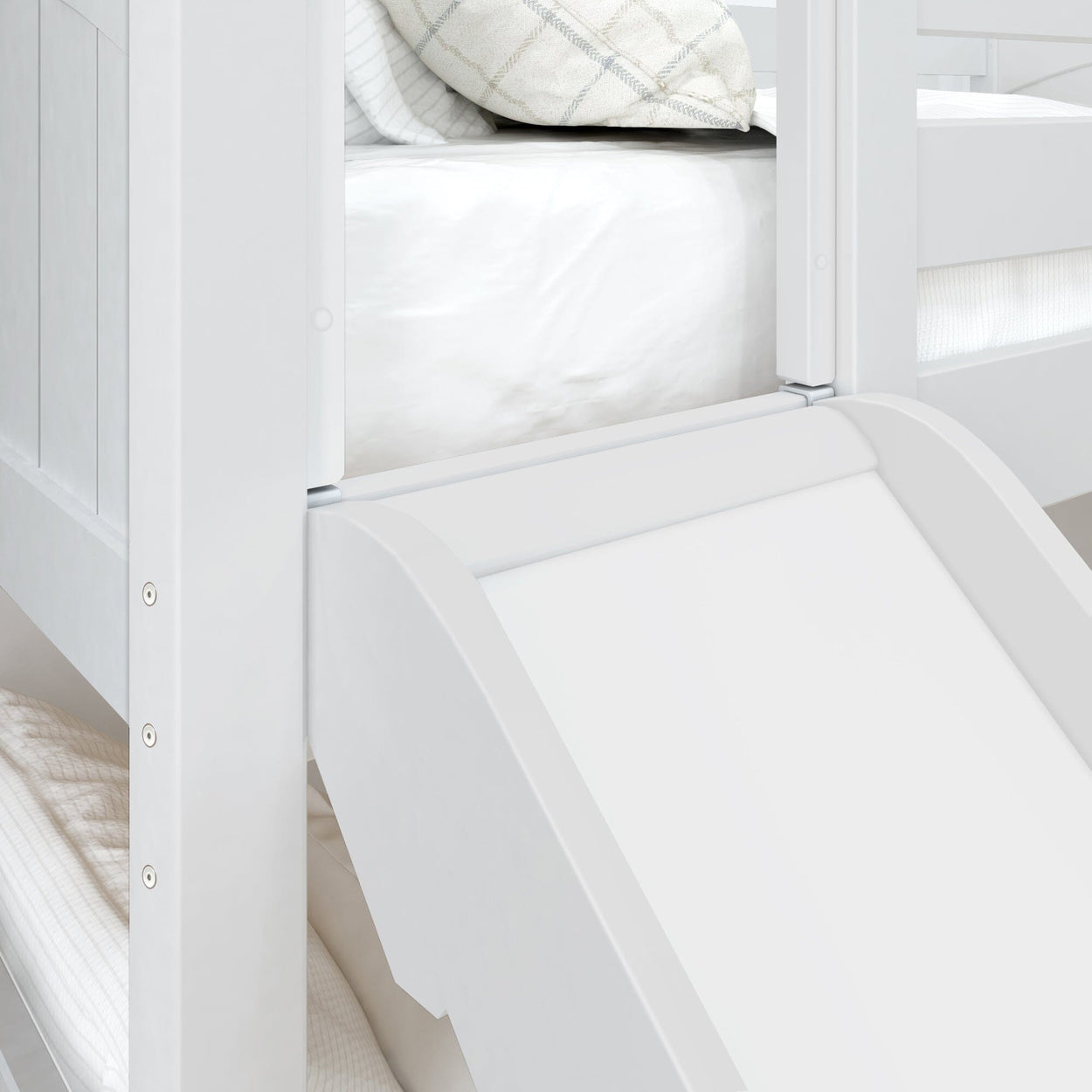 White wooden children's bunk bed with built-in slide, guardrail, mattress and neutral pillows, modern kids loft bed