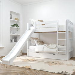White wooden twin-over-twin bunk bed with slide and under-trundle drawer in bright modern kids bedroom with ladder, neutral bedding, built-in shelves and geometric rug
