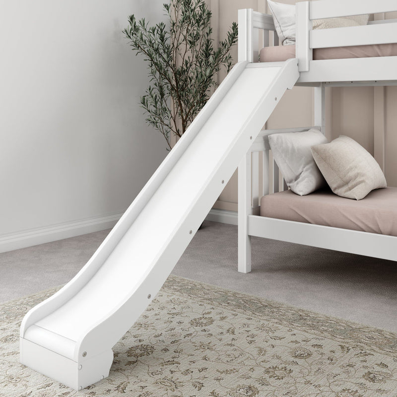 White wooden kids bunk bed with slide, blush mattress and neutral pillows in a modern nursery bedroom with potted plant and patterned rug
