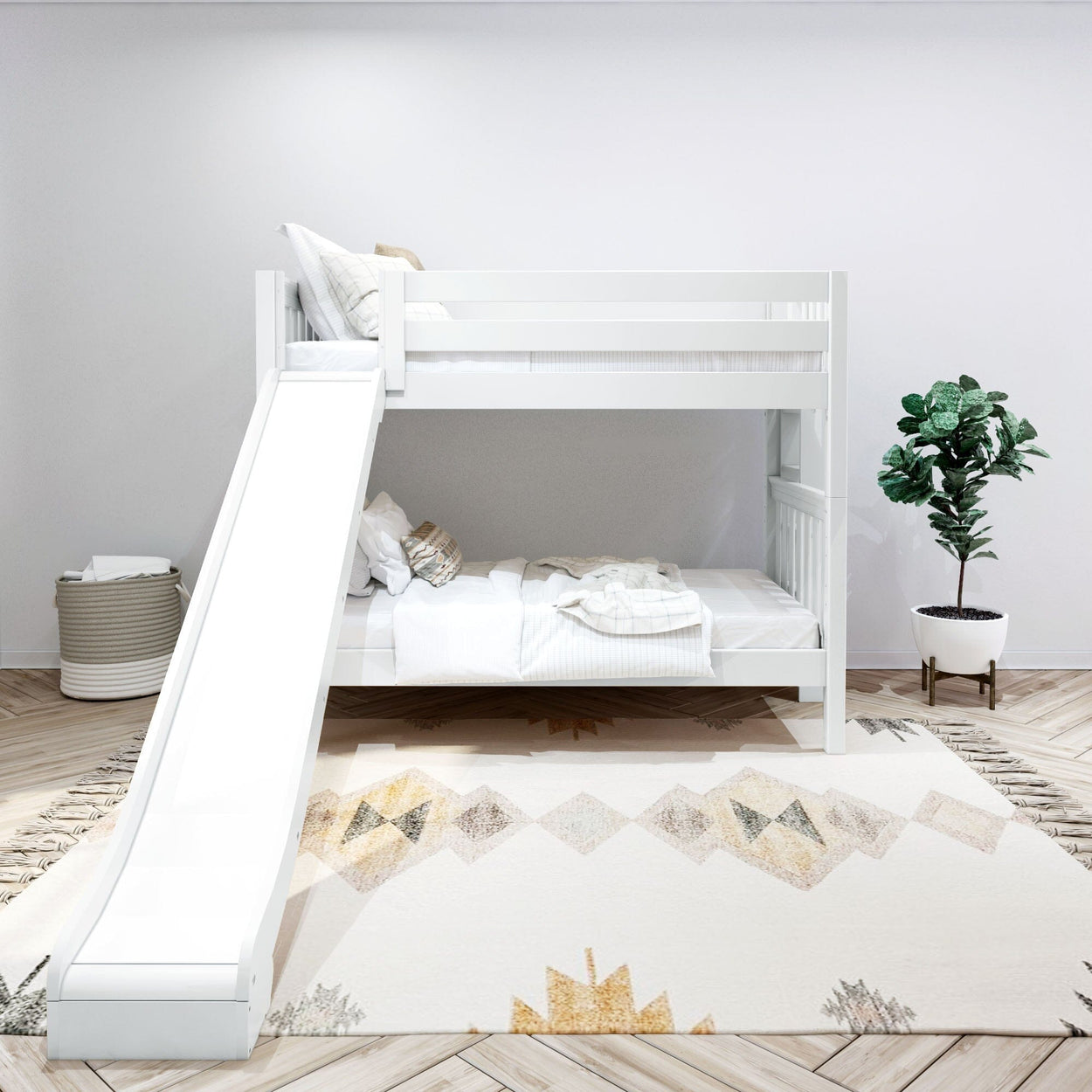 White kids' bunk bed with slide in modern bedroom featuring a geometric rug and potted plant.