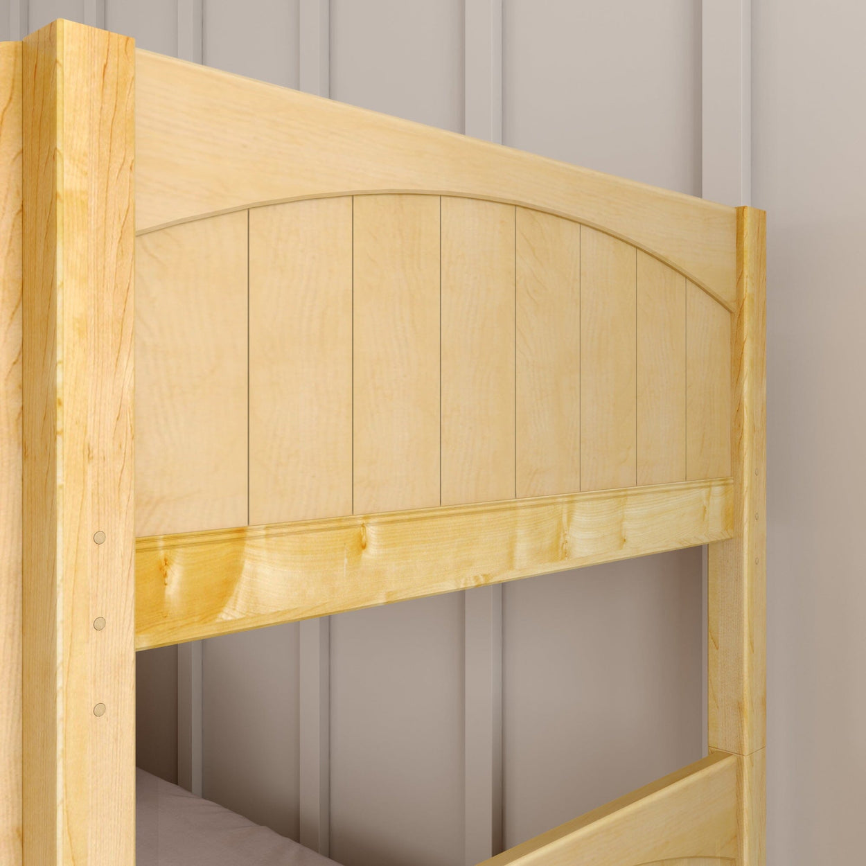 Wooden bunk bed frame with natural finish against a neutral wall background.