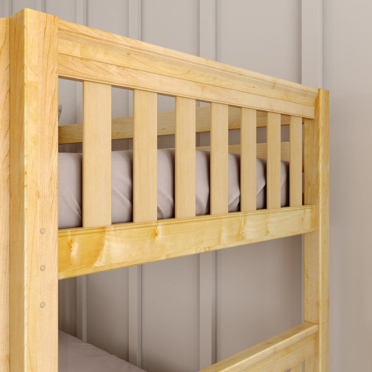 Wooden bunk bed frame with a light finish, showcasing sturdy construction and vertical slats.