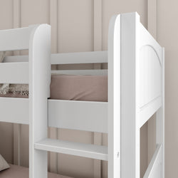 White wooden bunk bed with beige mattress in modern bedroom.