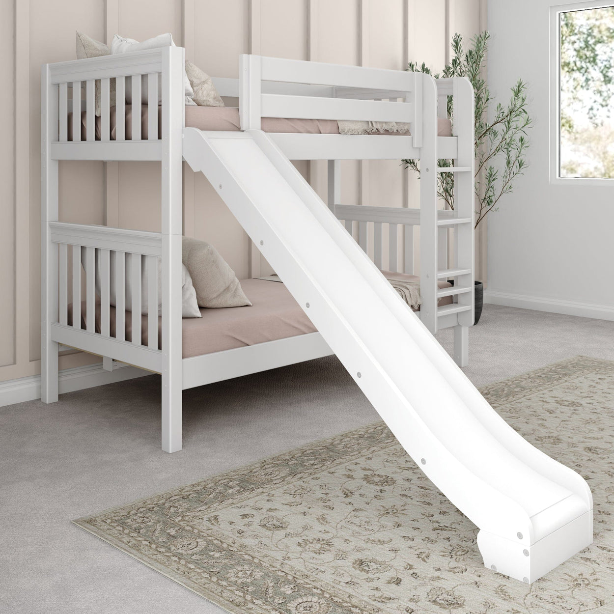 White wooden bunk bed with slide in cozy child's bedroom, featuring soft pastel bedding and decorative pillows.