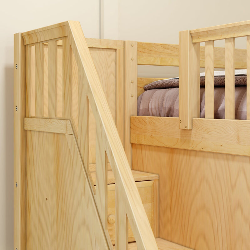 Solid pine bunk bed with built-in staircase and safety rails, close-up showing natural light wood grain and folded brown bedding