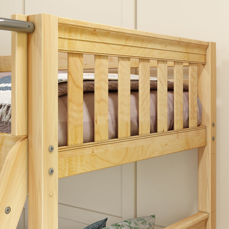 Natural light pine bunk bed close-up showing slatted guardrail, ladder attachment hardware and folded bedding