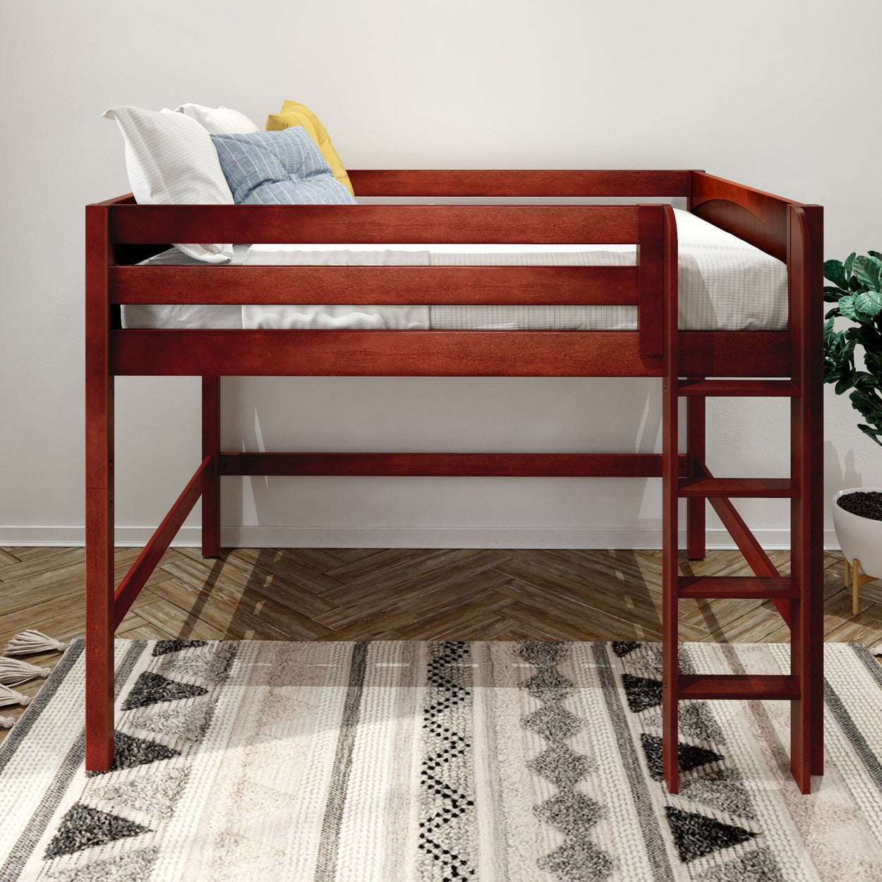 Cherry wood loft bed with ladder, twin elevated bed in kids' bedroom, space-saving design with mattress and pillows