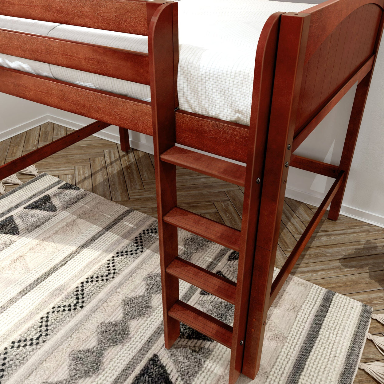 Close-up of red-brown wooden loft bed ladder attached to a twin loft bed over a patterned area rug and herringbone wood floor in a modern bedroom