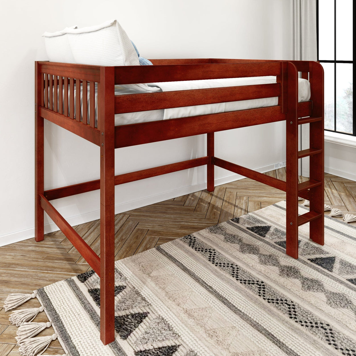 Cherry-red wooden loft twin bed with ladder, space-saving elevated single bed in modern bedroom with white bedding, patterned area rug and herringbone wood floor