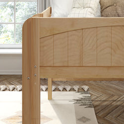 Natural oak platform bed with arched slatted panel headboard, Scandinavian modern styling, tassel boho rug on herringbone wood floor