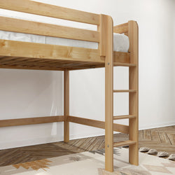 Light pine wood loft bed with built-in ladder and white mattress in a minimalist bedroom with patterned rug and herringbone hardwood floor