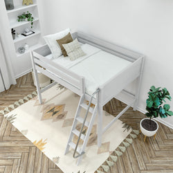 White wooden loft bed with ladder in modern kids bedroom, neutral bedding and decorative pillows over boho geometric rug on herringbone wood floor with potted plant and built-in wall shelves