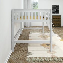 Space-saving white twin loft bed in a bright kids' bedroom with herringbone hardwood floors, tasseled geometric rug, wooden dresser and window