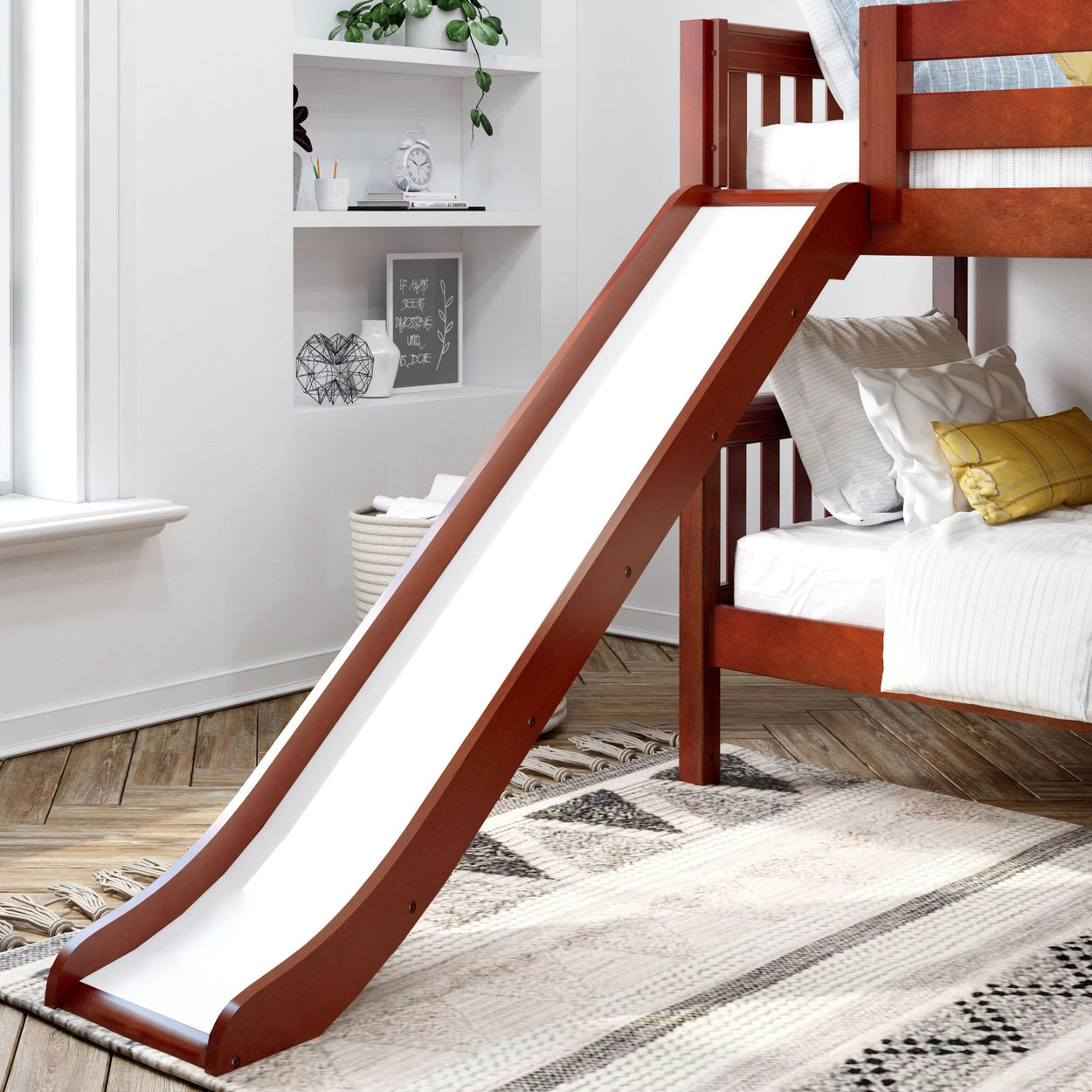 Wooden bunk bed with slide in a cozy children’s bedroom adorned with modern decor.