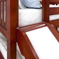 Wooden bunk bed with slide and white bedding.