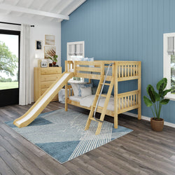 Children's bedroom with wooden bunk bed featuring a slide and ladder, modern decor, and blue accent wall.