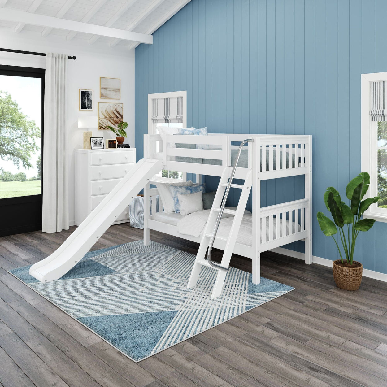 White bunk bed with slide in a modern blue-themed children's room with wooden floors and natural light.