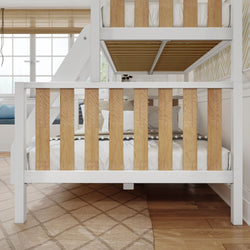 Wooden bunk bed frame with natural finish in a bright, cozy bedroom setting featuring a modern design.