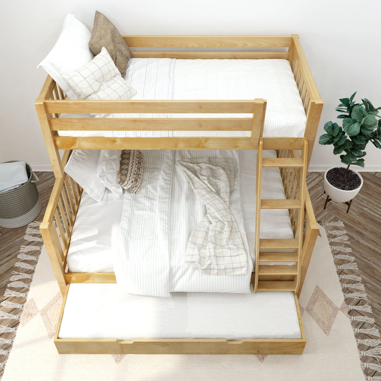 Wooden bunk bed with comfortable bedding in a modern, cozy bedroom setting featuring a soft rug and potted plant.