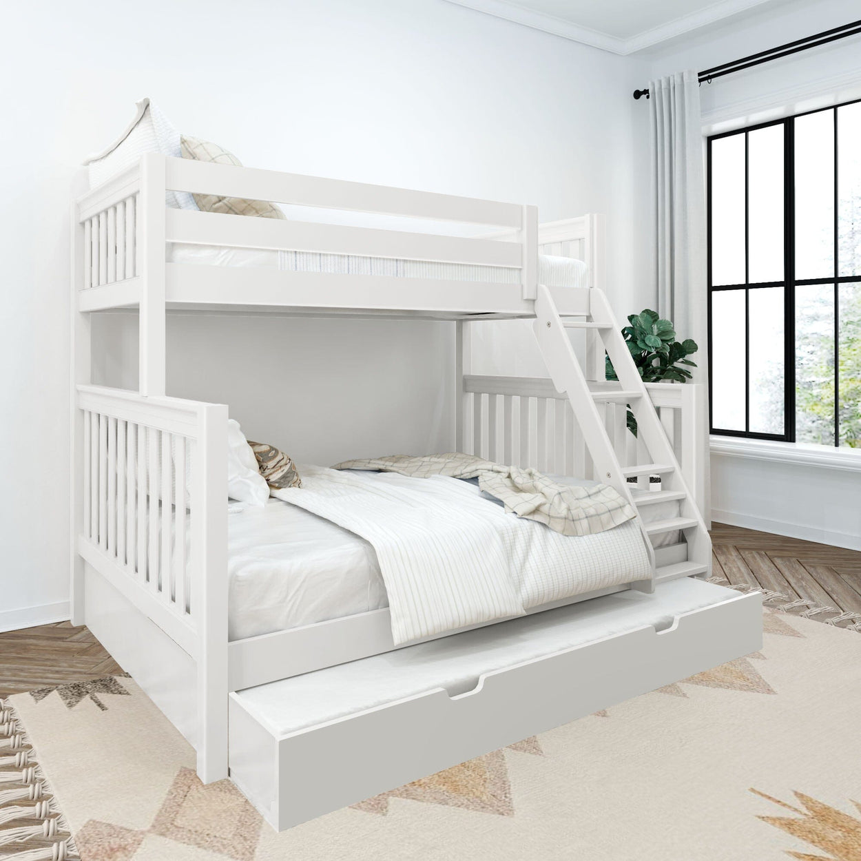 White wooden bunk bed with pull-out trundle and ladder in a bright contemporary bedroom with neutral bedding and large window