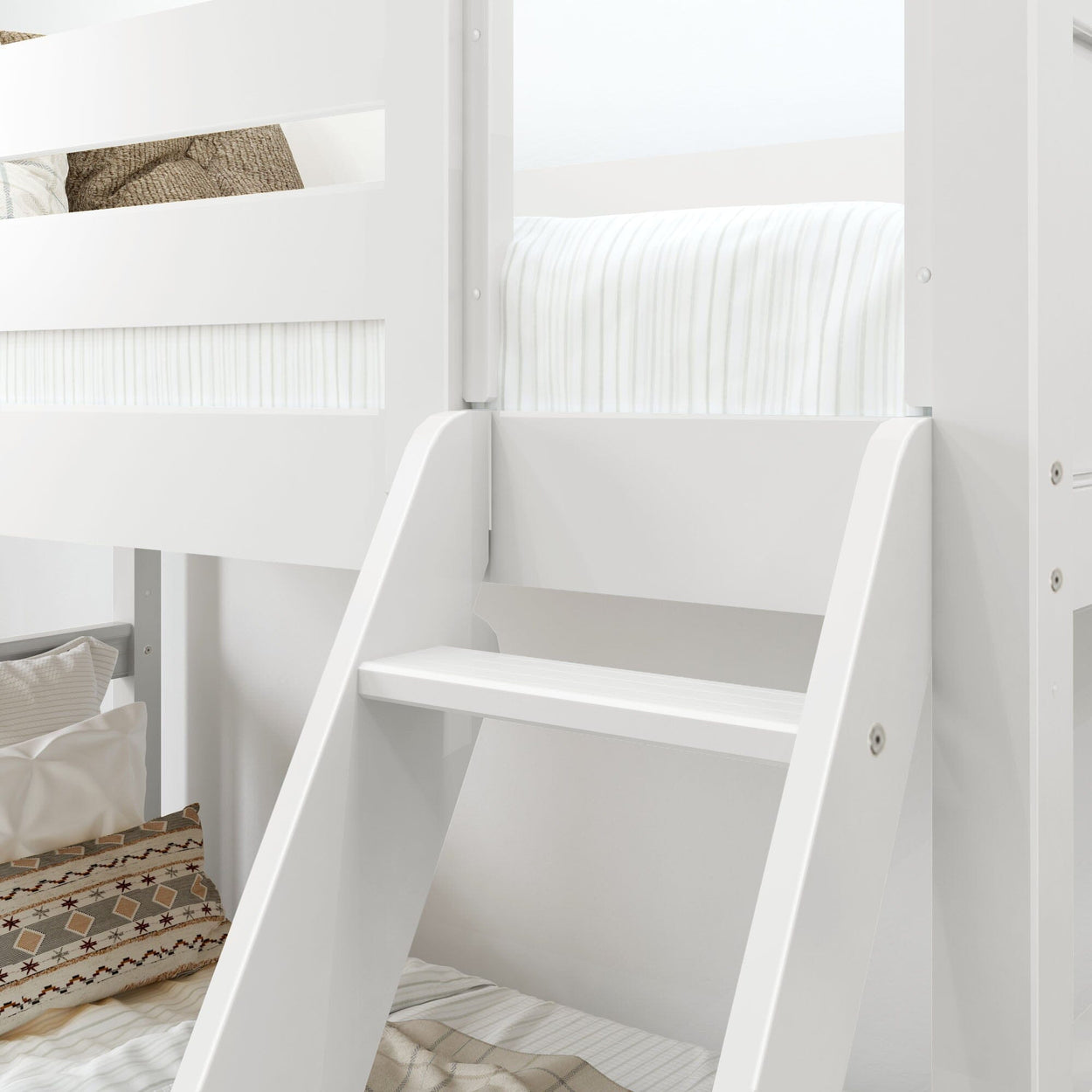 White wooden bunk bed with angled ladder and guardrail, top bunk with white striped bedding and decorative patterned pillow