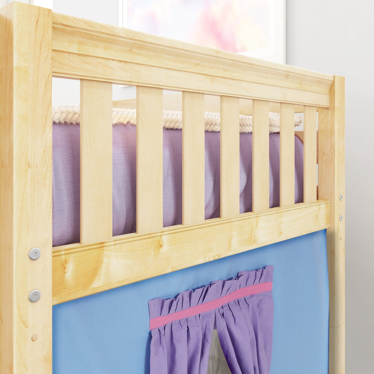 Wooden bunk bed frame with purple curtain, ideal for kids' bedrooms and space-saving solutions.