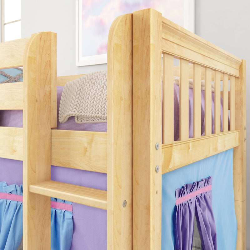 Close-up of a solid natural wood kids bunk bed with ladder, purple bedding, knitted throw and blue fabric storage pockets in a children's bedroom