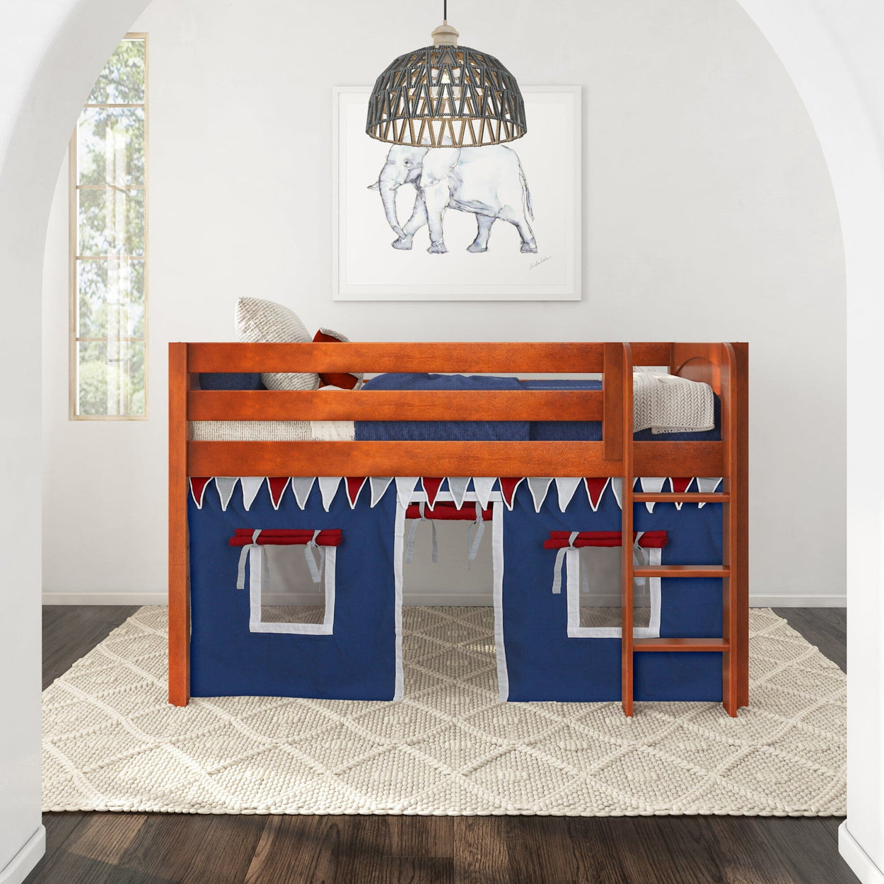 Children's wooden loft bed with blue and white tent, ladder, and elephant artwork in a modern bedroom.