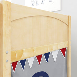 Wooden bed headboard with colorful triangle bunting decoration.