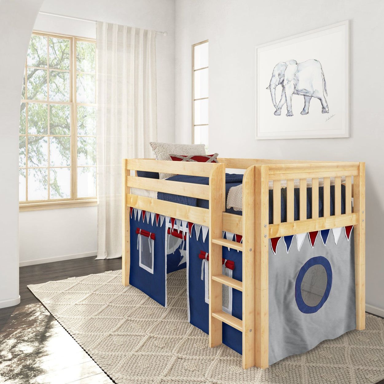 Children's wooden loft bed with navy blue and gray play tent, featuring decorative pennants, in a bright bedroom with window and elephant artwork.