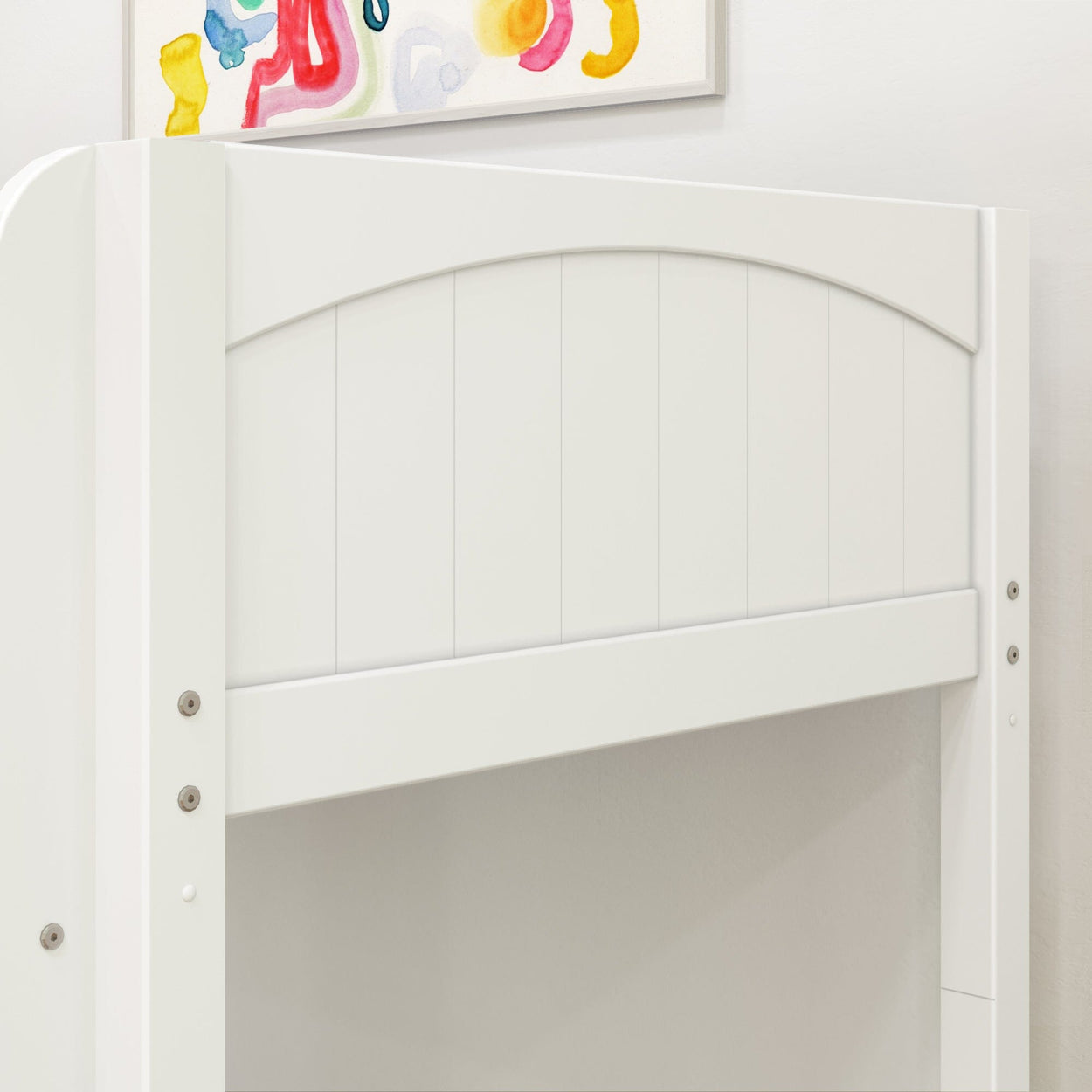White wooden loft bed with colorful wall art in modern bedroom.