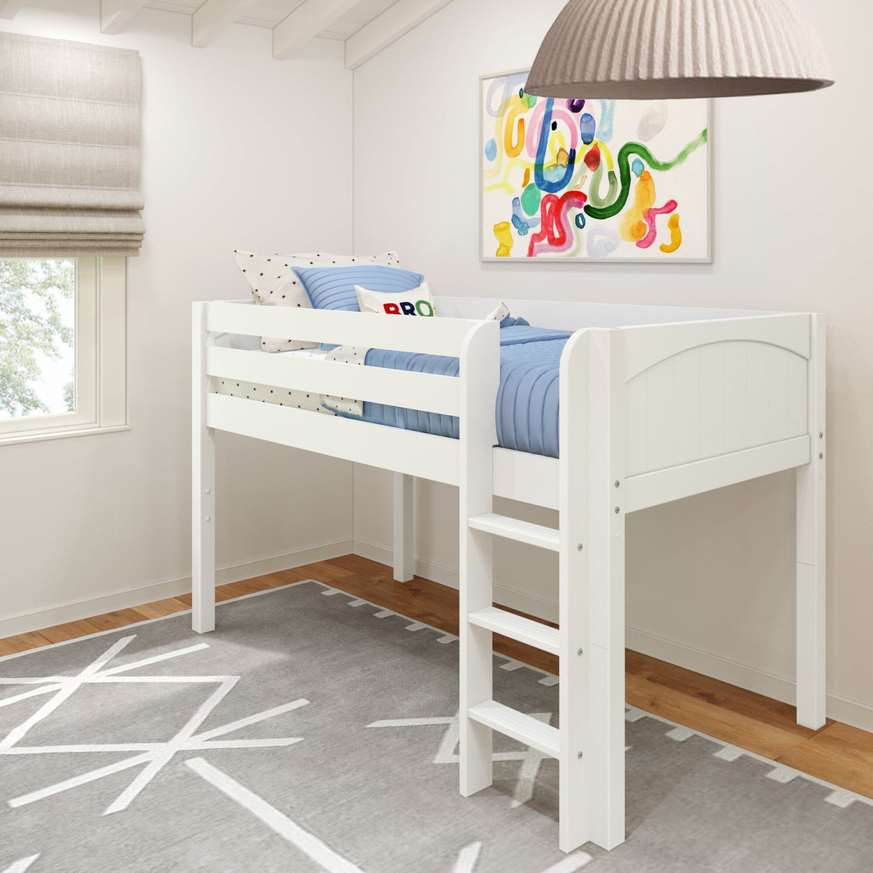 White loft bed with blue bedding in a modern children's bedroom featuring abstract wall art and a geometric rug.