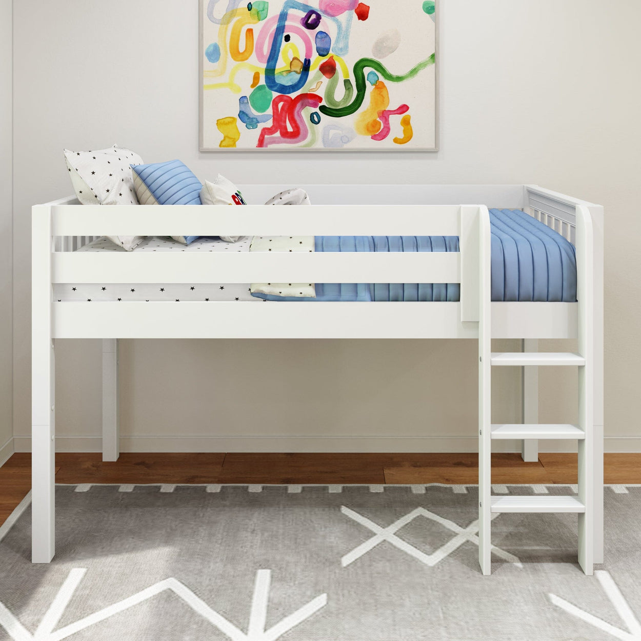 White loft bed with blue striped bedding and colorful abstract wall art in children's room.