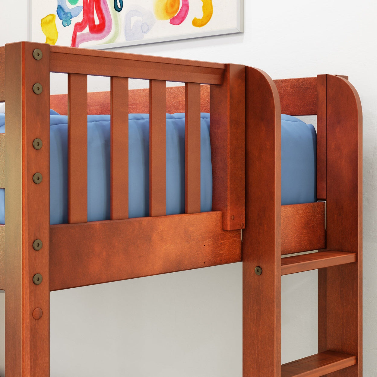 Close-up of solid wood loft bunk bed with blue mattress and built-in ladder, modern children's bedroom furniture