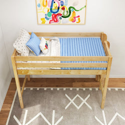 Elevated natural wood toddler bed with blue padded mattress, star-print sheets and decorative pillows in a modern kids' bedroom with abstract wall art and geometric rug