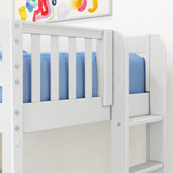 Close-up of a white wooden bunk bed with blue mattress, safety guardrail and ladder in a modern kids' bedroom with colorful wall art